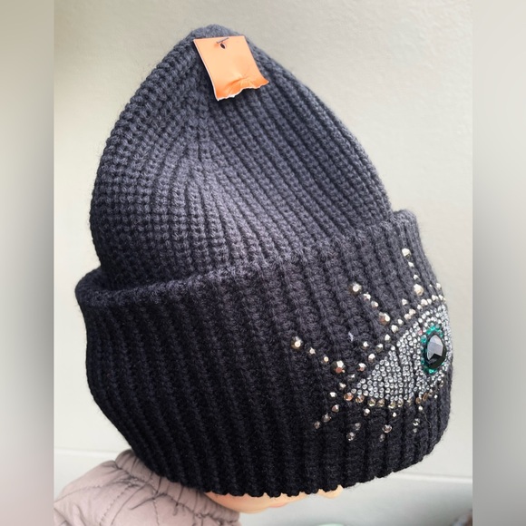 Black Beanie with Eye Design by Kurt Geiger.
NWOT - Picture 7 of 17